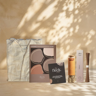 The Slow Morning gift set: an ecru SENA cotton robe, the Fleck Journal, the Fleck Deck, Rise & Shine tea and Balance incense