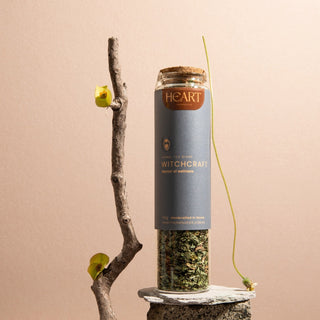 Witchcraft loose leaf tea in a tall glass jar