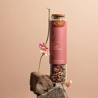 All Heart loose leaf tea in a tall glass jar