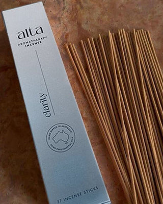Close up of the Clarity incense box and a bundle of sticks
