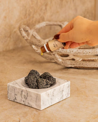 Lava stones in the marble holder, ready for a few drops of oil